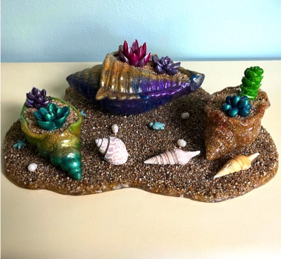 3 Seashell Planters, Resin Succulents And A Sand Display Base.